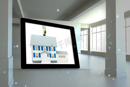 平板电脑屏幕上带有价格标签的房屋合成图像