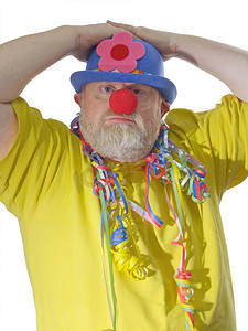 马戏团小丑帽子摄影照片_戴蓝帽子的小丑