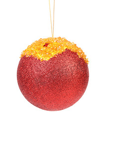圣诞红摄影照片_圣诞红球覆盖琥珀色面包屑。