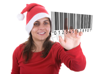 红色网购摄影照片_手机的圣诞女人网购并扫描条形码购买圣诞礼物