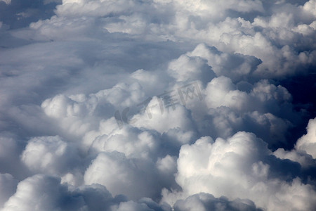 白色照片摄影照片_飞机上的云彩照片