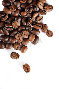 咖啡豆纹理摄影照片_孤立在白色的咖啡豆