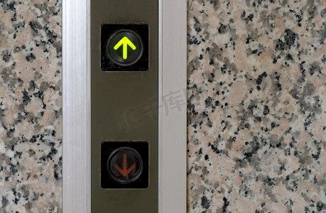 提升的箭头摄影照片_向上标志的电梯按钮