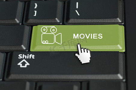 带有鼠标光标的键盘上的电影按钮