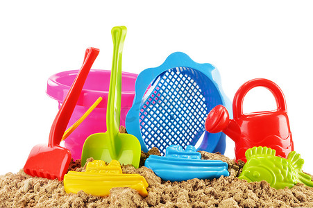 在沙坑或沙滩上玩耍的塑料儿童玩具