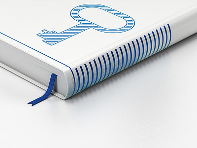蓝色白色科技封面摄影照片_安全概念：封闭的书，白色背景上的钥匙