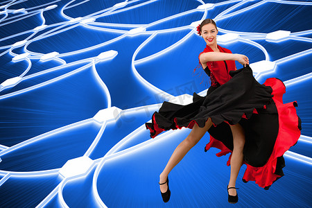 黑裙子摄影照片_穿着红黑裙子跳舞的女人的合成图像