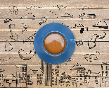 手绘桌子摄影照片_蓝色咖啡杯的合成图像