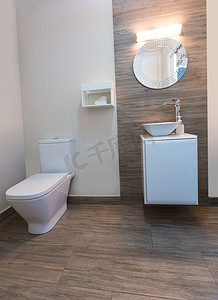 卫生间装饰摄影照片_有圆的镜子现代室内的卫生间洗手间