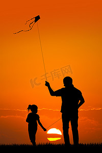 父亲和儿子带着风筝