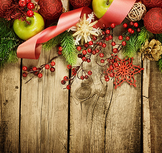 边框庆祝摄影照片_旧木背景上的圣诞复古装饰边框设计