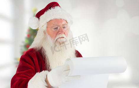 党建名单摄影照片_检查他的名单的圣诞老人的综合图象