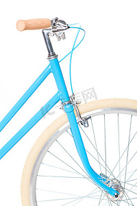刹车踏板摄影照片_孤立在白色的时尚女式蓝色自行车