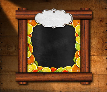 水果模板摄影照片_带木制框架和水果的黑板