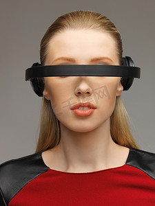 cyborg摄影照片_戴着未来派眼镜的女人