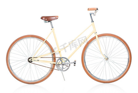 刹车踏板摄影照片_孤立在白色的时尚棕色自行车