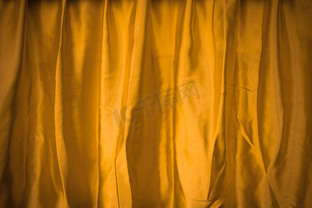 背景的黄色织物丝绸纹理