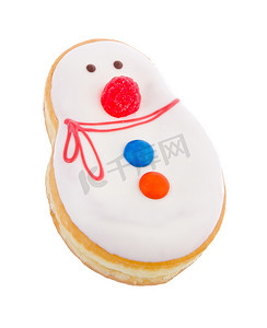 雪人照片摄影照片_背景中的甜甜圈、雪人糕点