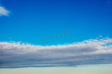 双十一主图大气摄影照片_白云覆盖着蓝天