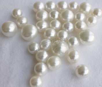珍珠白纯色摄影照片_白色南洋珍珠。