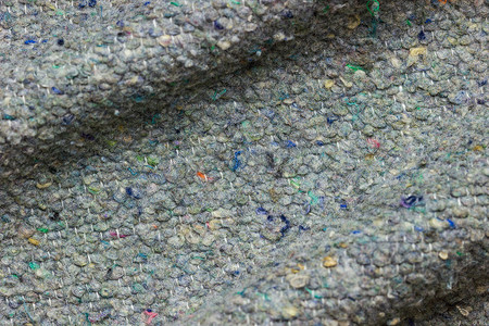 旧布织物制成的毯子的质地和皱纹。 