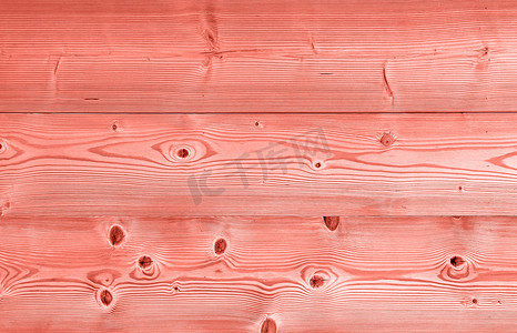 粉色调背景摄影照片_珊瑚粉色调复古木板背景