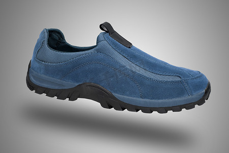 引导欢迎页摄影照片_白色背景上的蓝色皮鞋，孤立的产品。
