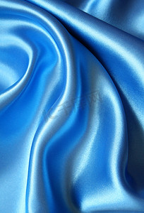 深蓝色布料摄影照片_光滑优雅的深蓝色丝绸