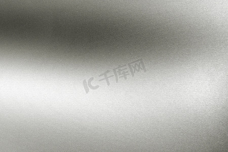金属质感拉丝摄影照片_拉丝光滑的银色金属质感，抽象背景