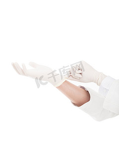个人表彰易拉宝摄影照片_拉着白色手术手套的医生的手