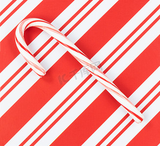 图案边框图案摄影照片_圣诞条纹图案与假日 bac 的单个糖果手杖