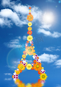 埃菲尔铁塔从花朵与反射和太阳反对蓝色 s