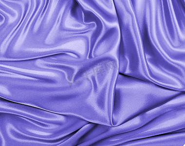 丝绸背景摄影照片_美丽时尚的紫色丝绸