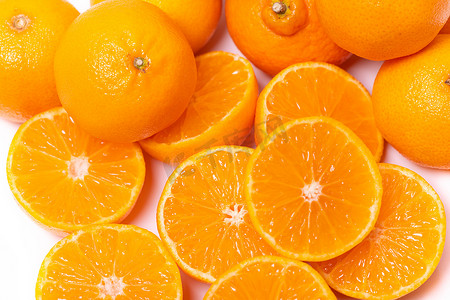 半圆圈摄影照片_一套切成两半的橘子