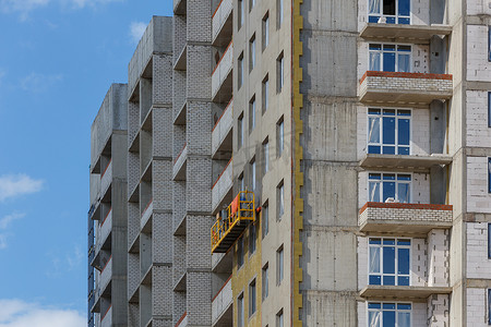 公寓复式摄影照片_在建的多公寓住宅楼的施工摇篮