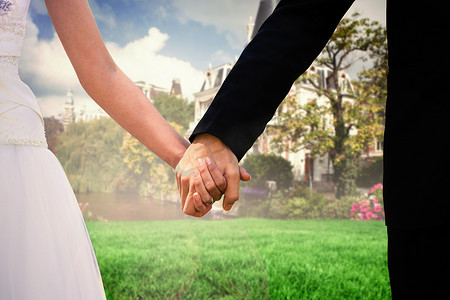 新婚夫妇在公园手牵手的中段合成图