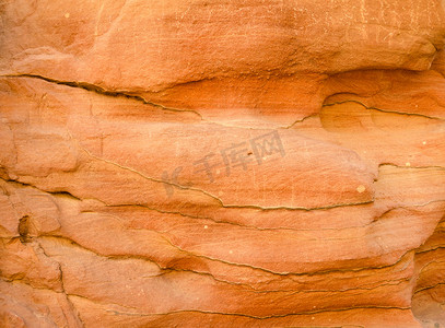 彩色峡谷中橙色石岩的质地特写