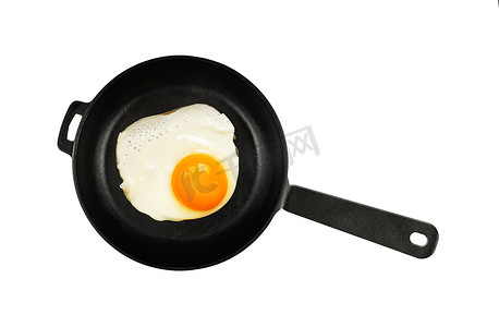 剪鸡蛋摄影照片_黑铸铁锅煎鸡蛋