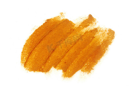 暗红磨砂摄影照片_用姜黄标记磨砂膏。