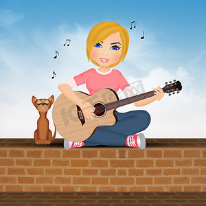坐在墙上弹吉他的女人