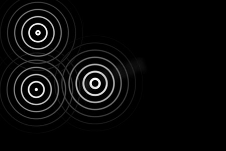 黑色背景上带环形灯的抽象白色圆圈