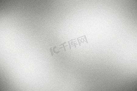 银色流沙摄影照片_发光的粗砺的银色金属板材，抽象纹理背景