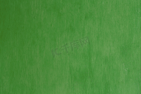 老绿色被绘的胶合板平面纹理和背景
