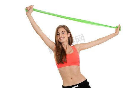 运动型年轻女子用理疗胶带乳胶胶带锻炼