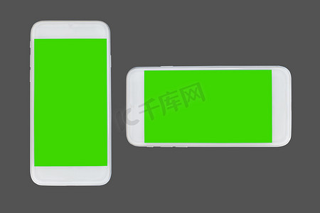 苹果手机样机白色摄影照片_灰色背景下孤立的智能手机绿色剪裁。