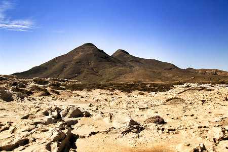地质纹理摄影照片_背景中的化石沙丘纹理和火山
