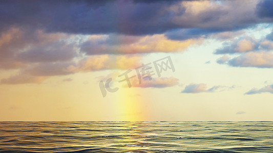 彩虹波浪摄影照片_海面上的彩虹