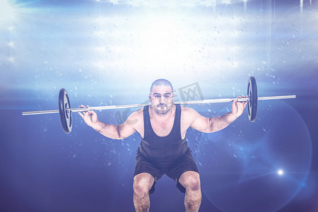 健美运动员举重杠铃重量的合成图像