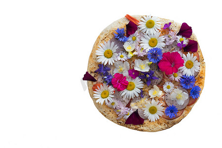 快地摄影照片_用五颜六色的花盖的创造性的比萨饼。一块创造性的比萨饼