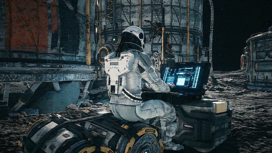 一名宇航员在其中一颗新行星的太空基地使用笔记本电脑工作。 